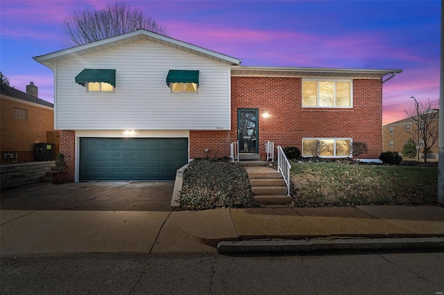 view of front of property featuring a garage