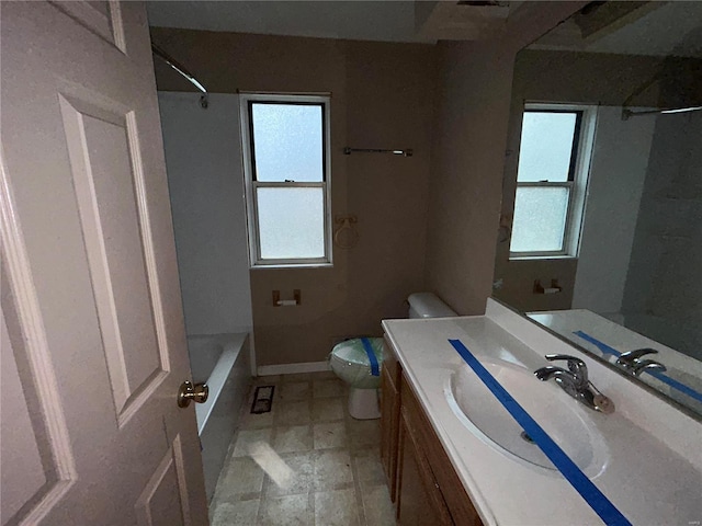 bathroom with vanity and toilet