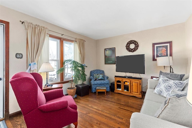 living room with dark hardwood / wood-style floors