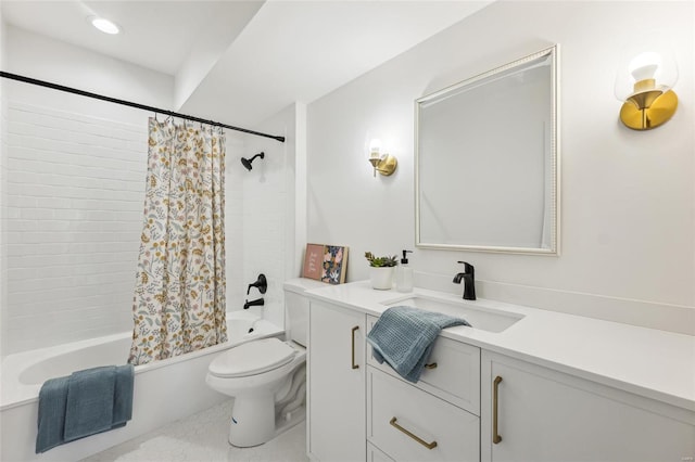 full bathroom with vanity, toilet, and shower / bath combo with shower curtain