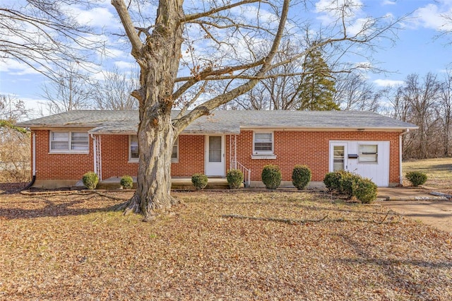 single story home with a garage