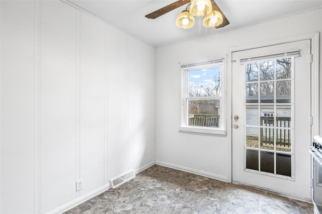 spare room with ceiling fan