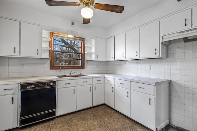 kitchen featuring sink, dishwasher, ceiling fan, tasteful backsplash, and white cabinets