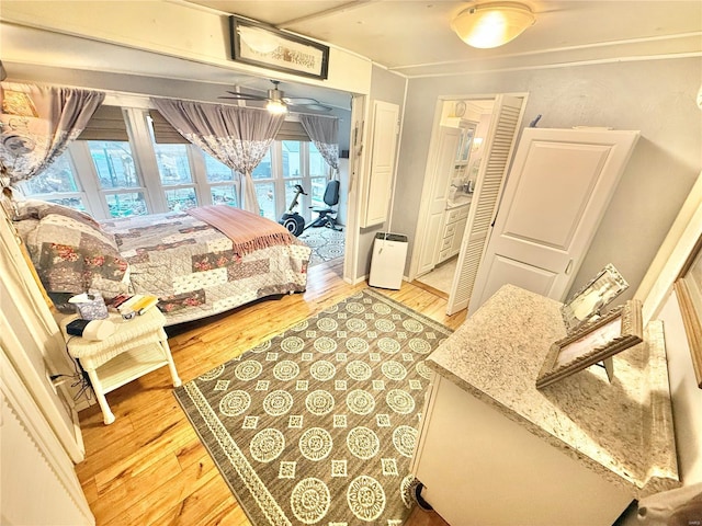 bedroom with light hardwood / wood-style flooring