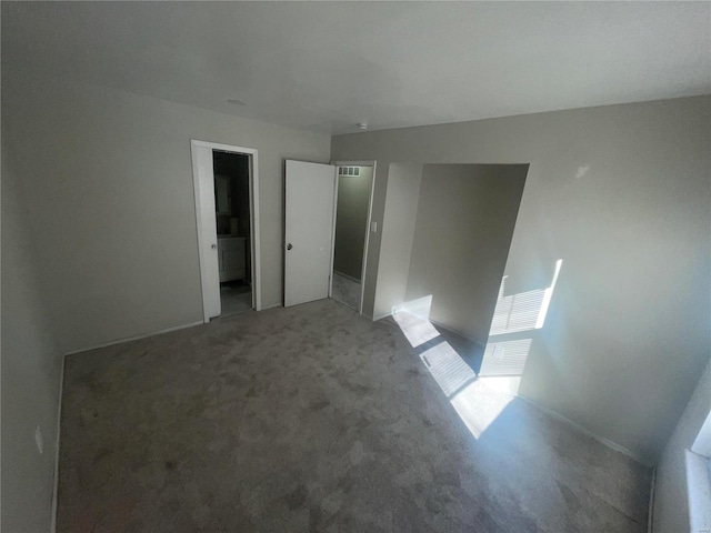 empty room featuring carpet floors