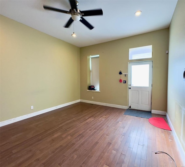 interior space with hardwood / wood-style flooring and ceiling fan