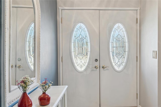 entrance foyer featuring french doors