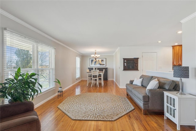 living room featuring a notable chandelier, crown molding, recessed lighting, light wood-style floors, and baseboards