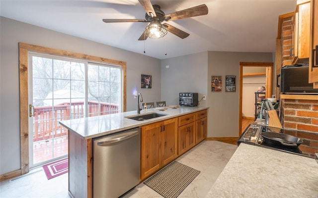 kitchen with sink, kitchen peninsula, dishwasher, and ceiling fan