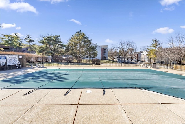 pool featuring fence