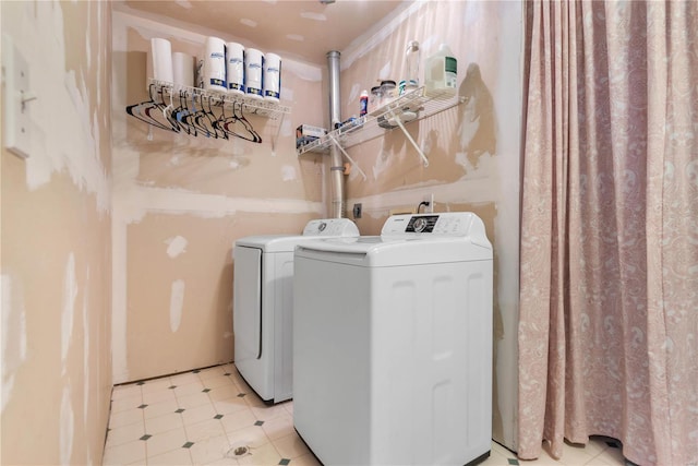 laundry room with washer and clothes dryer