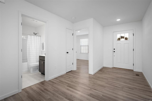 foyer entrance featuring light hardwood / wood-style floors