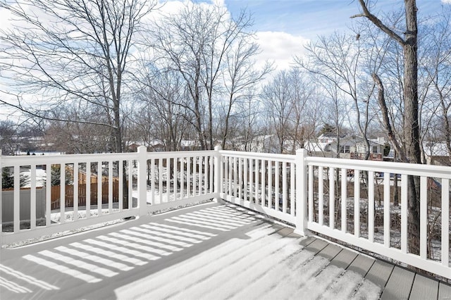 view of snow covered deck