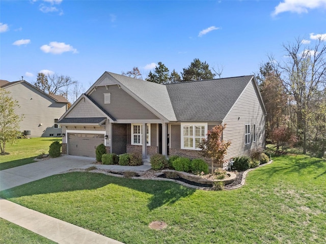 view of front facade featuring a garage and a front lawn