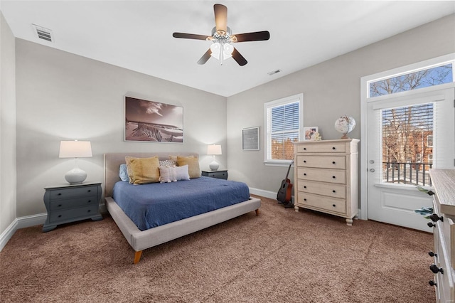 carpeted bedroom featuring access to exterior and ceiling fan