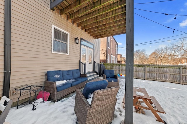 view of snow covered patio