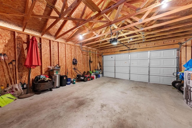 garage featuring a garage door opener