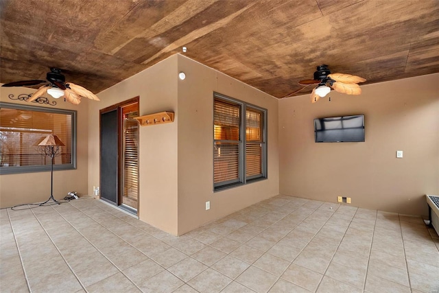 view of patio featuring ceiling fan