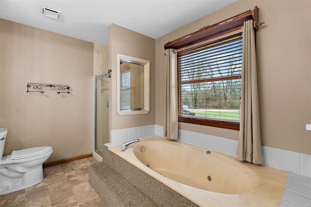 bathroom with plus walk in shower and toilet