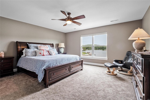 carpeted bedroom featuring ceiling fan