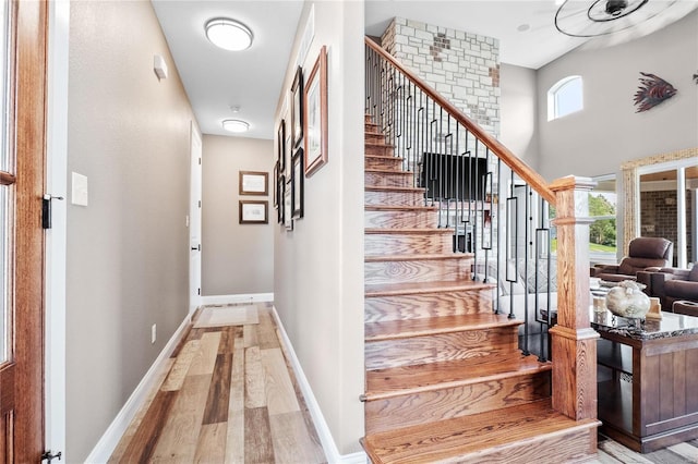 stairway with wood-type flooring