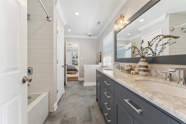 ensuite bathroom featuring ensuite bathroom, double vanity, ornamental molding, and a sink