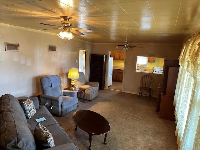 living room with ceiling fan, a wall mounted air conditioner, and carpet floors