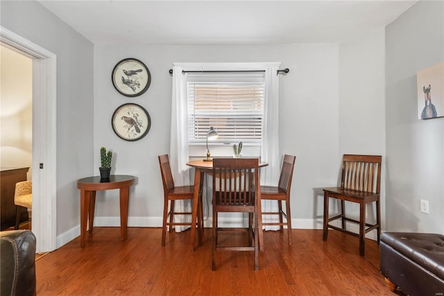 dining area featuring wood-type flooring