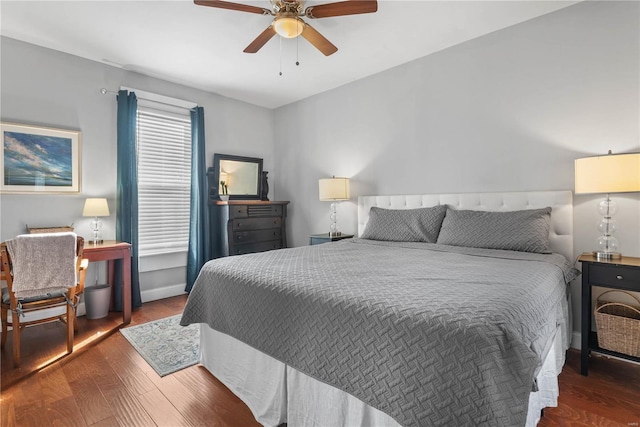 bedroom with hardwood / wood-style flooring and ceiling fan