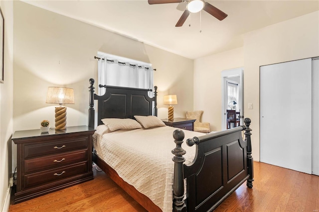 bedroom with ceiling fan and wood-type flooring