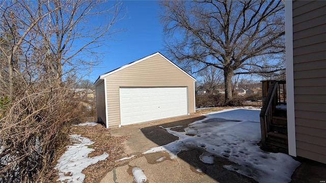 view of snow covered garage