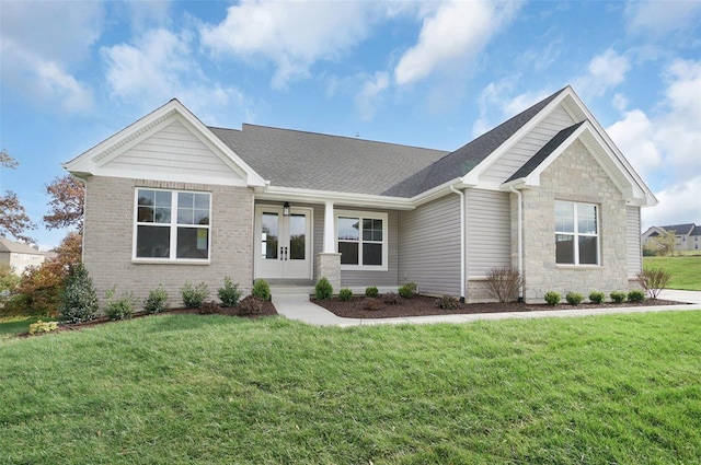 craftsman-style home featuring a front lawn