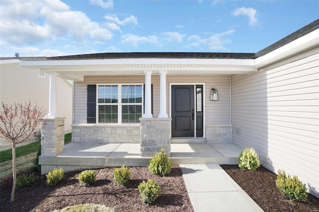 property entrance featuring a porch