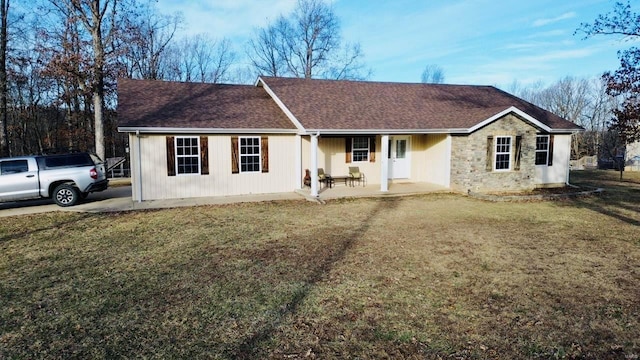 ranch-style home with a front yard