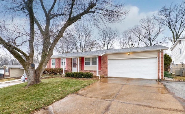 ranch-style home with a garage and a front yard