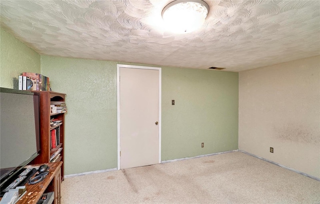 interior space featuring a textured ceiling