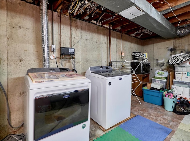 laundry area featuring washer and clothes dryer