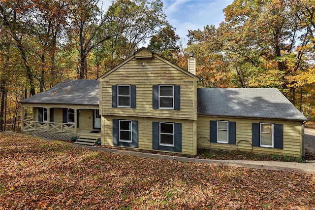 view of front of property featuring covered porch