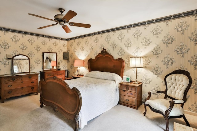 carpeted bedroom with ceiling fan