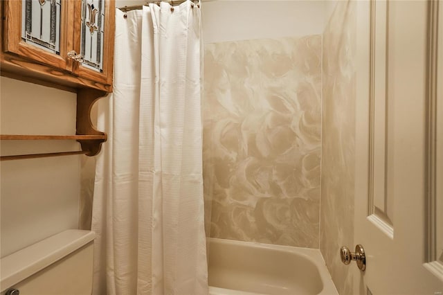 bathroom with shower / bath combo