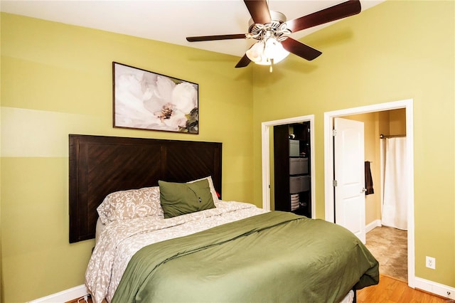 bedroom featuring hardwood / wood-style floors and ceiling fan