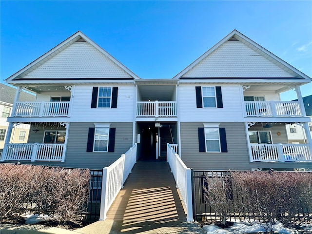 view of front of house with a balcony