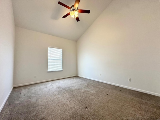 carpeted spare room with high vaulted ceiling and ceiling fan