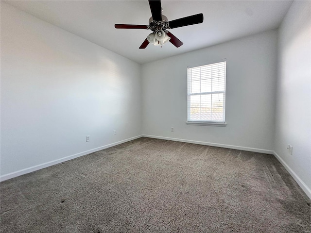 unfurnished room featuring carpet floors and ceiling fan