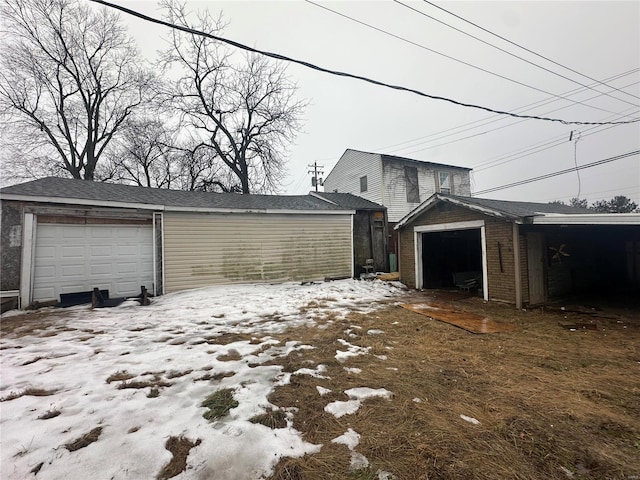 view of snow covered garage