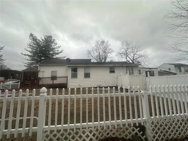 view of front of house with a wooden deck