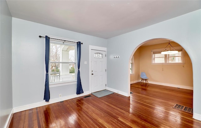 entrance foyer featuring hardwood / wood-style flooring