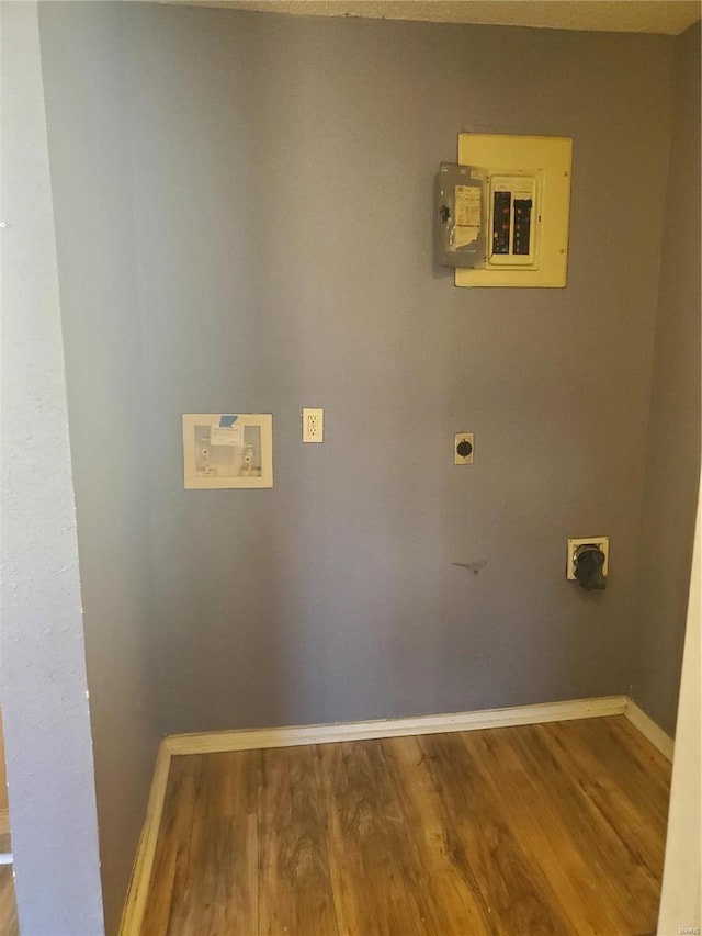 laundry area featuring washer hookup, hardwood / wood-style flooring, electric panel, and hookup for an electric dryer