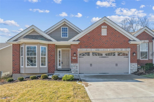 view of front of house with stone siding, brick siding, driveway, and an attached garage