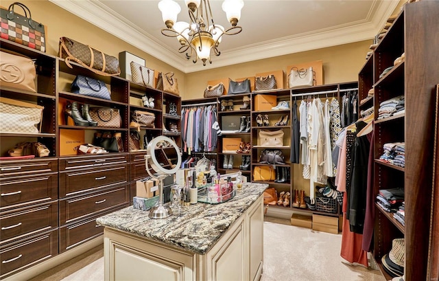 walk in closet featuring a notable chandelier and light colored carpet